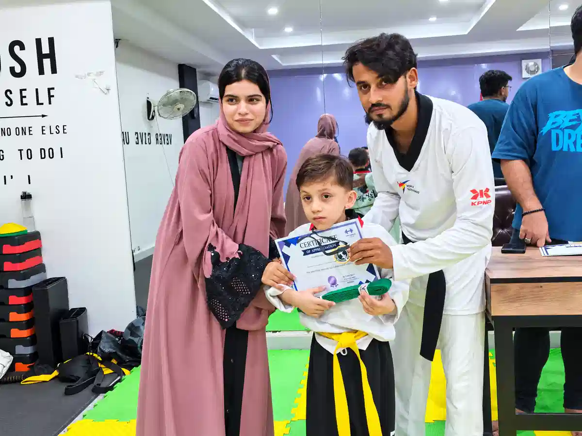 Taekwondo certificate presentation for a young Alpha student